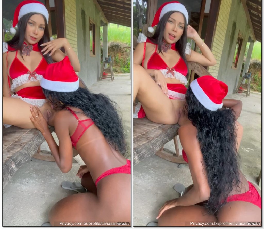 Livia Santana, com uma roupa de Mamãe Noel, curtindo uma brincadeira com a amiga