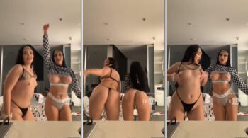 Mikaela Testa e uma colega fazendo uma dança sensual em frente ao espelho, vestindo só calcinha e com as teta à mostra